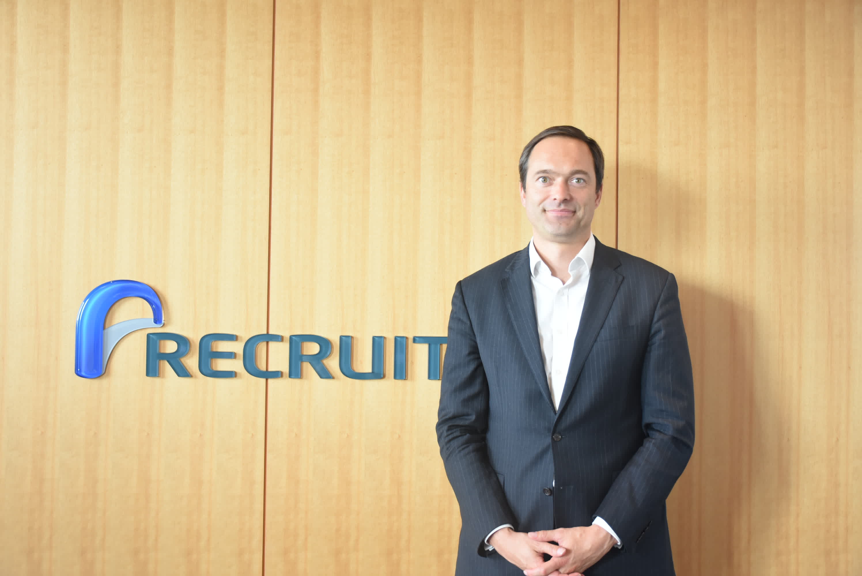 A photo of Professor Jan-Emmanuel De Neve at Recruit Holdings’ office